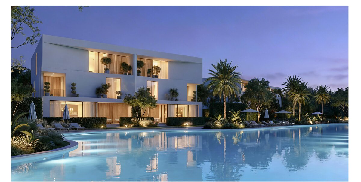 The Soul villa at twilight beside the community lagoon